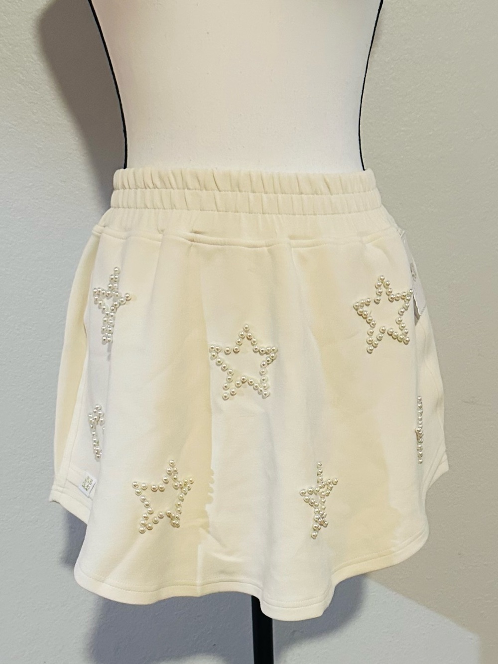 Pearl Star Embellished Cream Skirt with shorts underneath